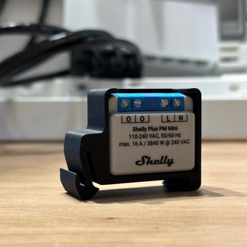 Suport de Sina DIN pentru Shelly MINI, din material ignifug, negru MINIDIN